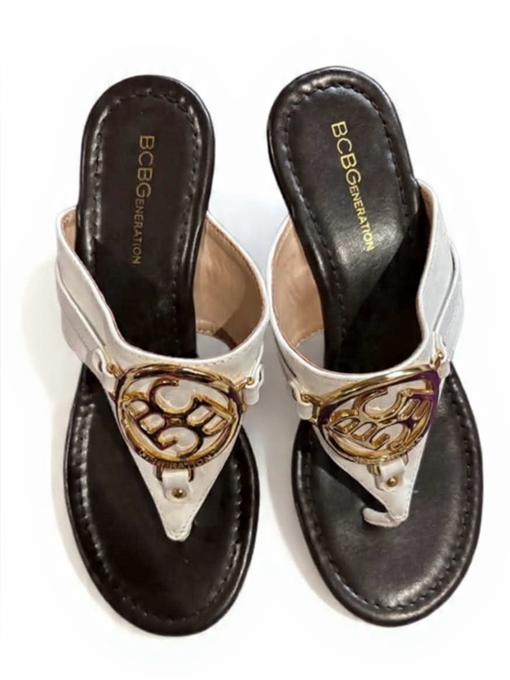 BCBGeneration White Thong Sandals with Gold Emblem